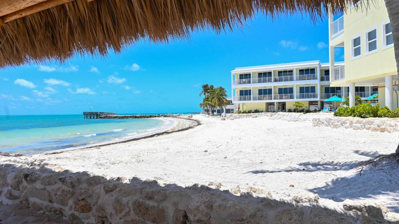 Beachfront hotel with clear sky and ocean view in Key West