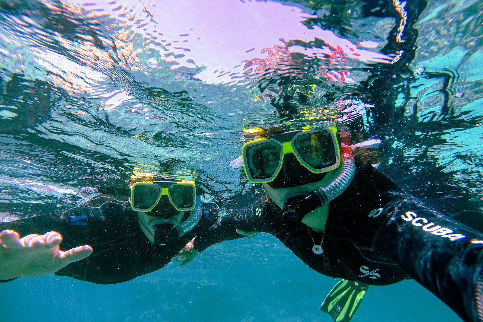 a person in scuba gear under water